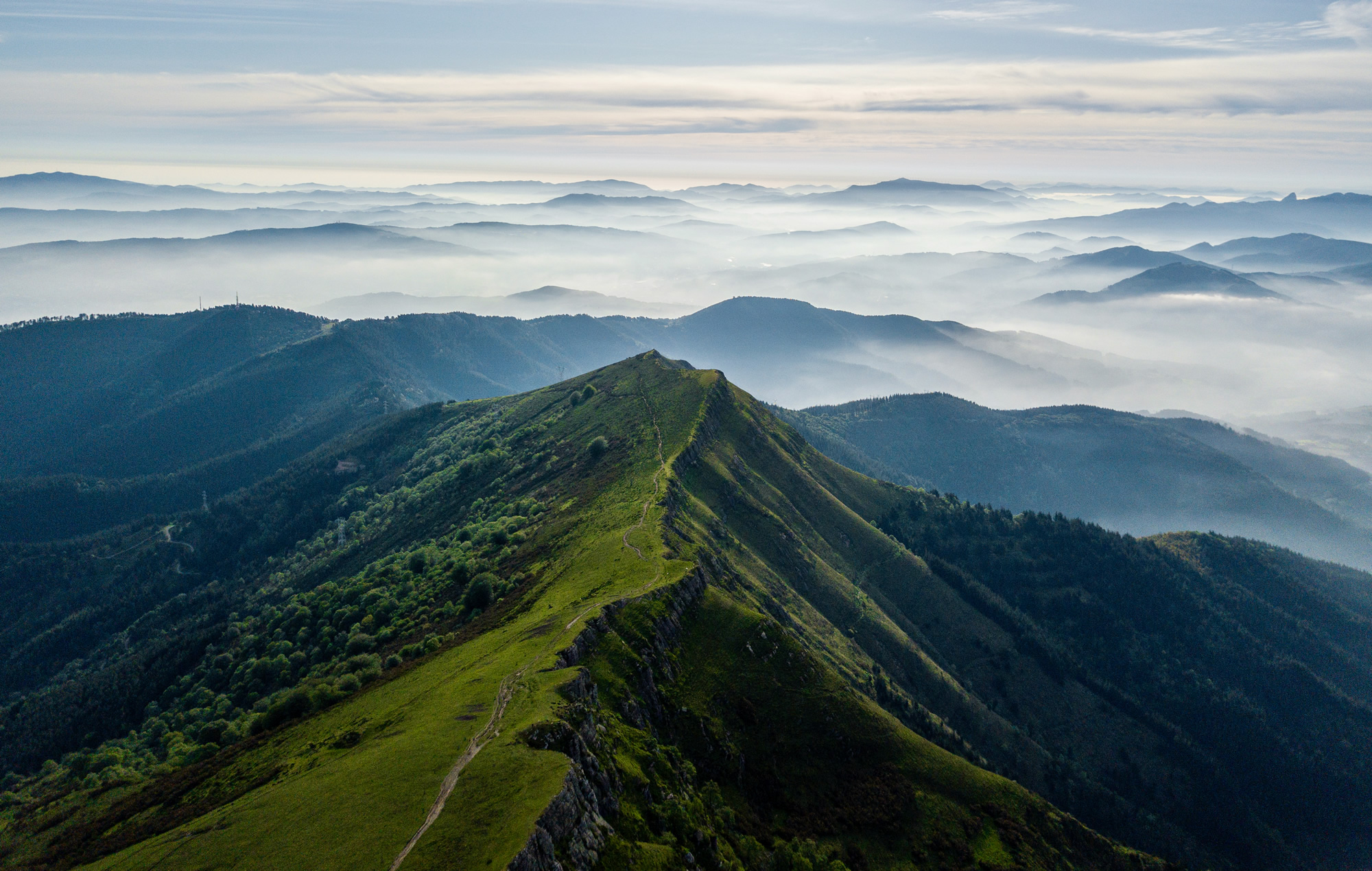 high angle shot foggy hills 